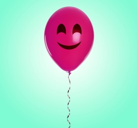 Crimson balloon with happy face on turquoise gradient background