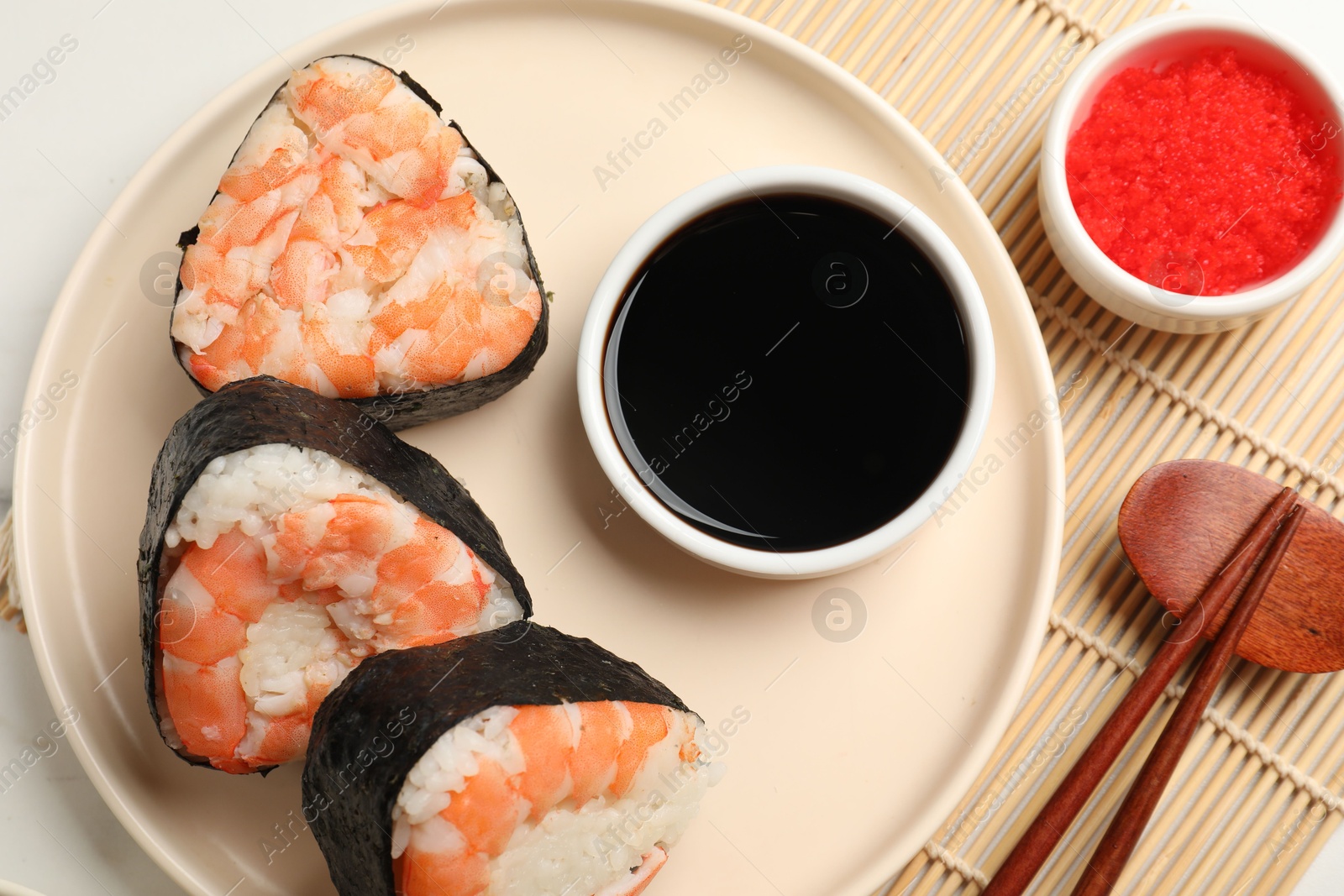 Tasty onigiri (Japanese rice balls) with shrimps served on table, flat lay Photo of Tasty onigiri (Japanese rice balls) with shrimps served on table, flat lay