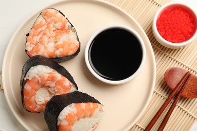 Photo of Tasty onigiri (Japanese rice balls) with shrimps served on table, flat lay