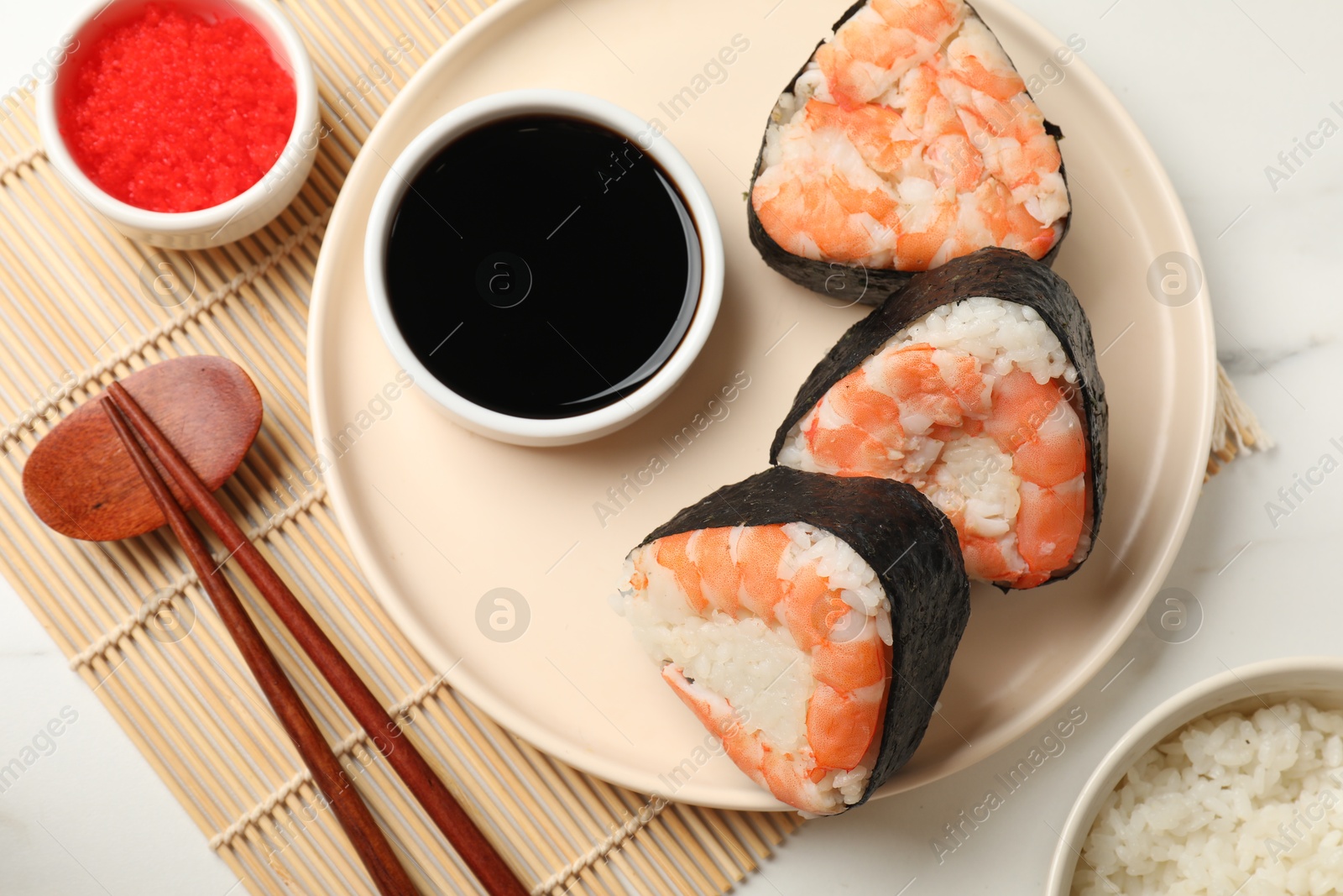 Tasty onigiri (Japanese rice balls) with shrimps served on white marble table, flat lay Photo of Tasty onigiri (Japanese rice balls) with shrimps served on white marble table, flat lay
