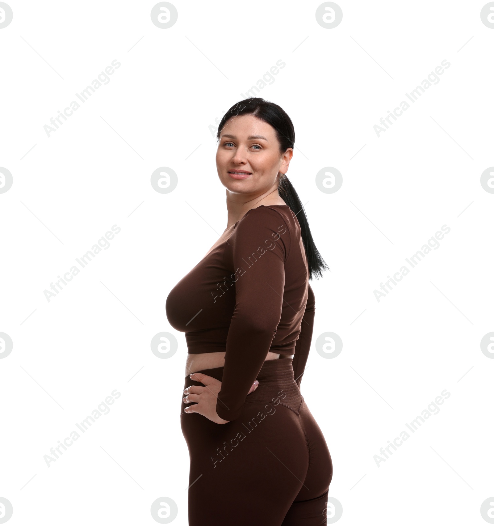 Photo of Plus size woman in gym clothes on white background