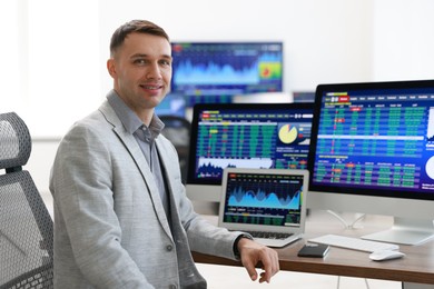 Portrait of financial trading specialist in office