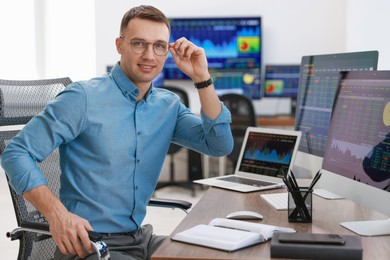 Photo of Portrait of financial trading specialist in office