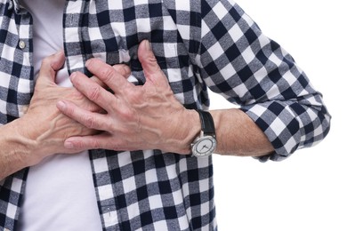 Heart attack. Senior man suffering from pain in chest on white background, closeup