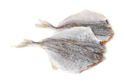 Dried cod fish fillets isolated on white