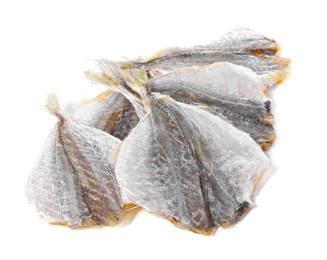 Dried cod fish fillets isolated on white