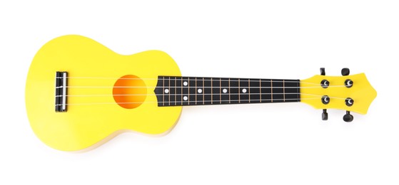 Yellow toy guitar isolated on white, top view. Child's musical instrument