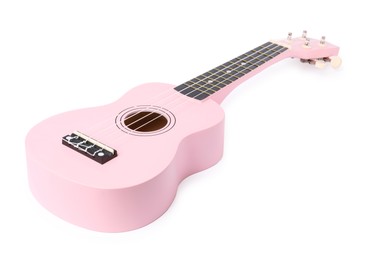 Photo of Pink toy guitar isolated on white. Child's musical instrument