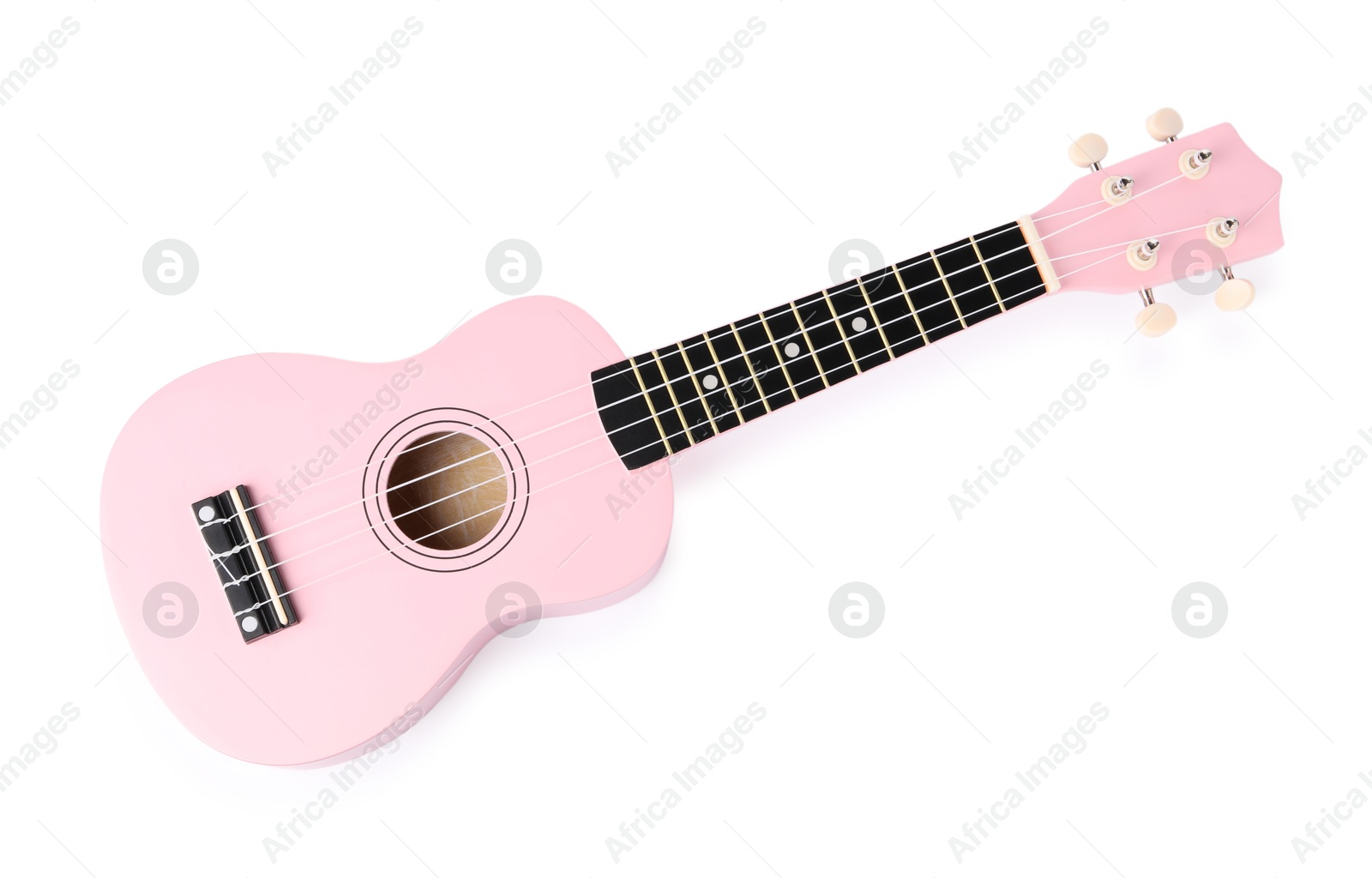 Photo of Pink toy guitar isolated on white, top view. Child's musical instrument