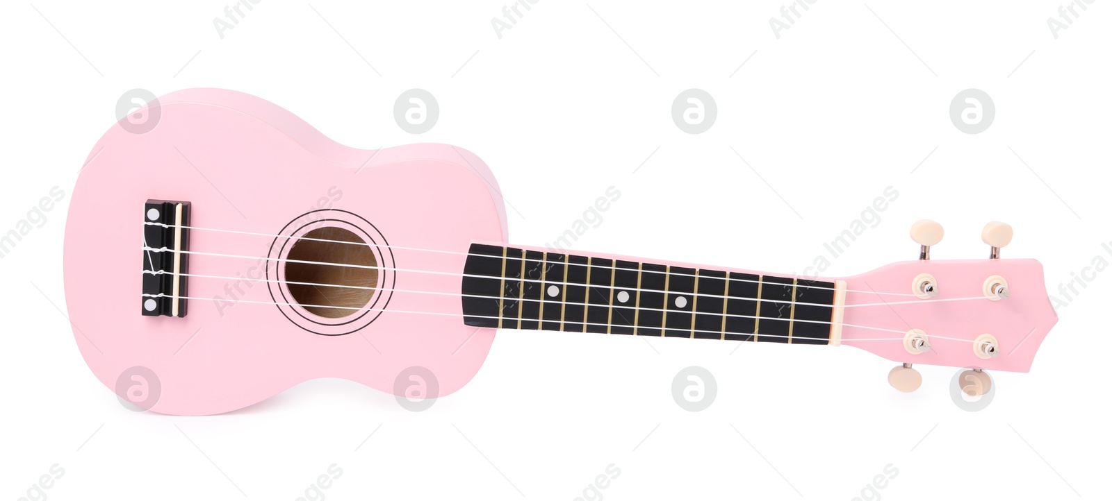 Photo of Pink toy guitar isolated on white. Child's musical instrument