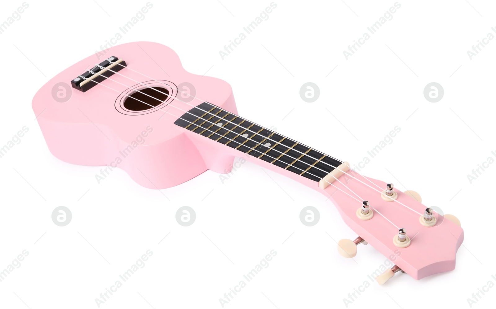 Photo of Pink toy guitar isolated on white. Child's musical instrument