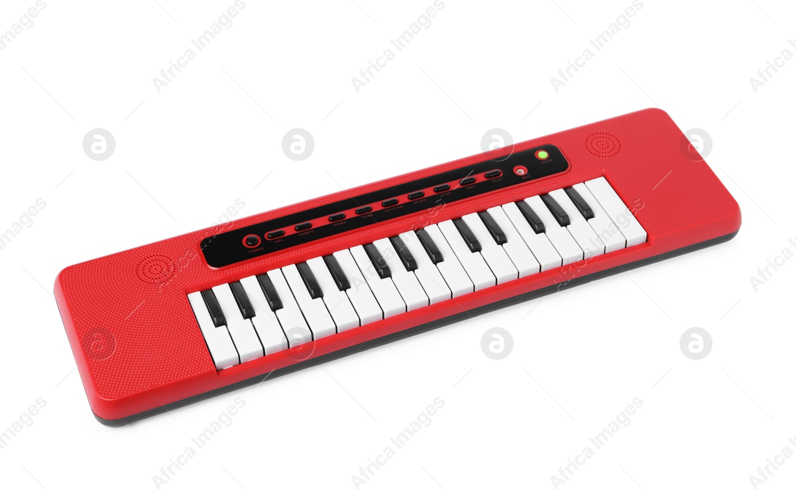 Photo of Red toy electric piano isolated on white