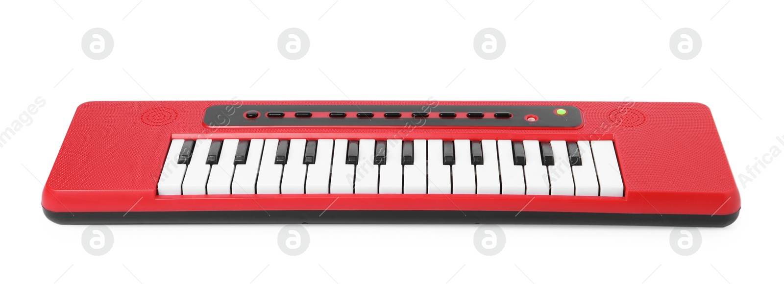 Photo of Red toy electric piano isolated on white