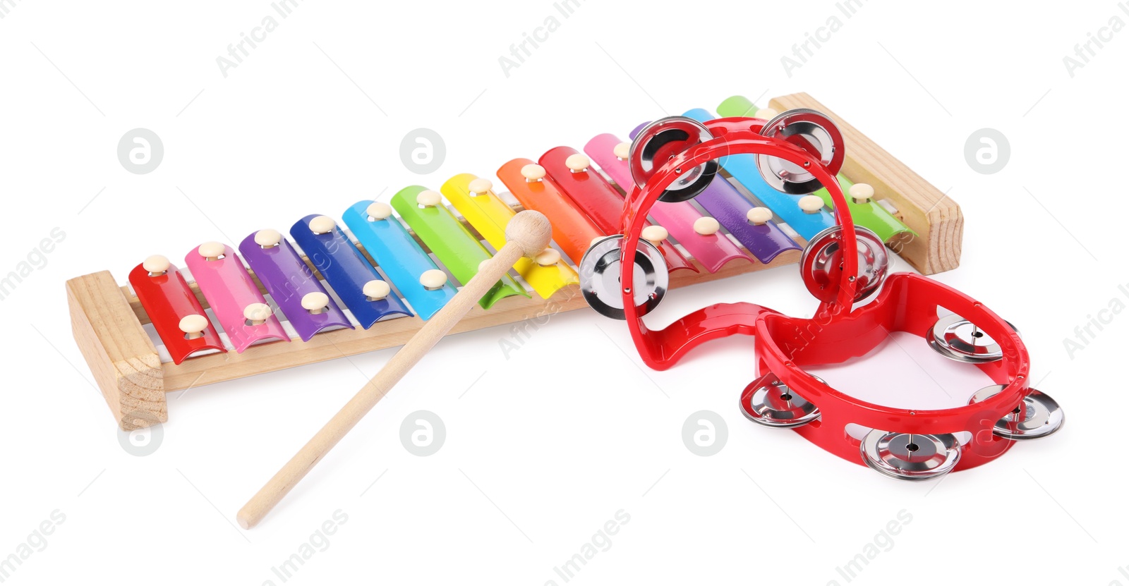 Photo of Colorful toy musical instruments isolated on white