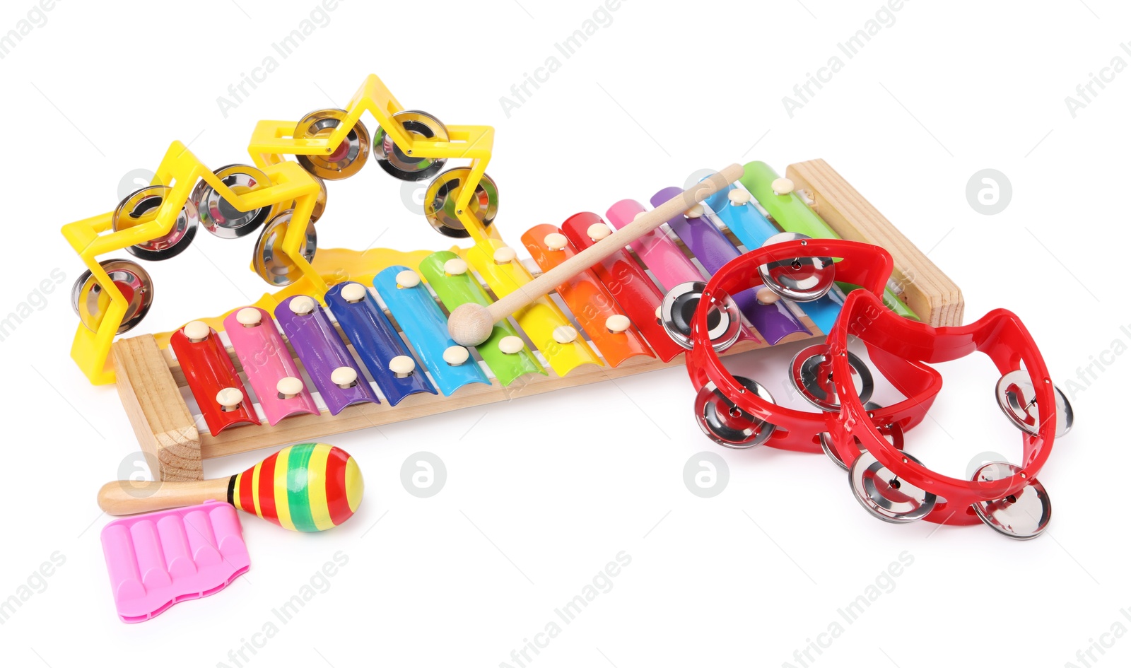 Photo of Colorful toy musical instruments isolated on white