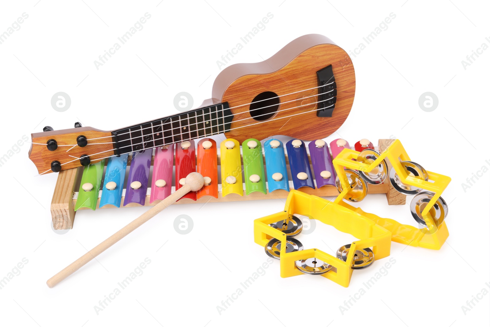 Photo of Colorful toy musical instruments isolated on white