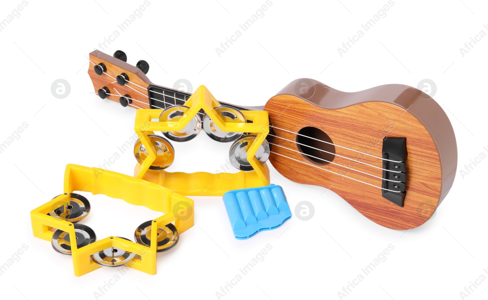 Photo of Colorful toy musical instruments isolated on white