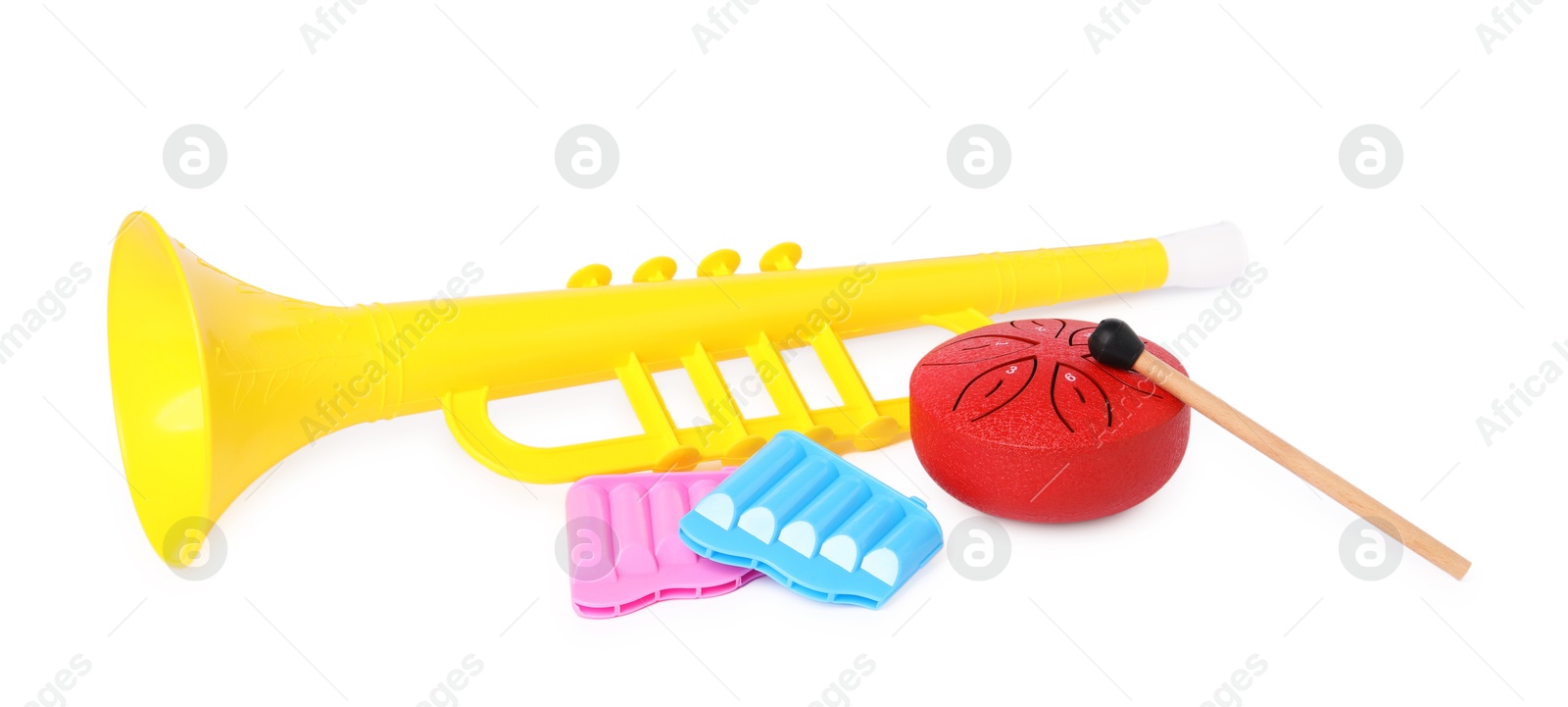 Photo of Colorful toy musical instruments isolated on white