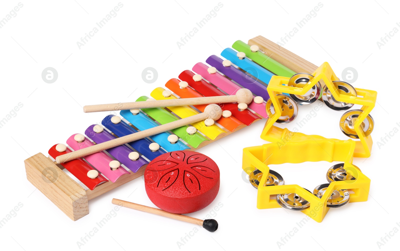 Photo of Colorful toy musical instruments isolated on white