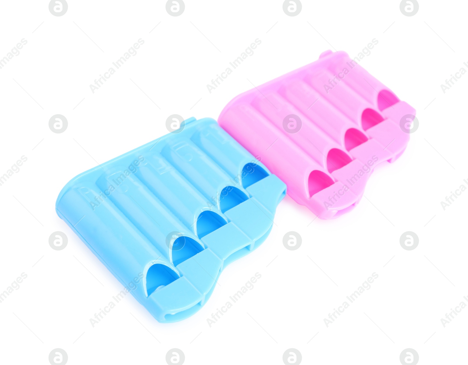 Photo of Toy harmonicas isolated on white. Child's musical instrument