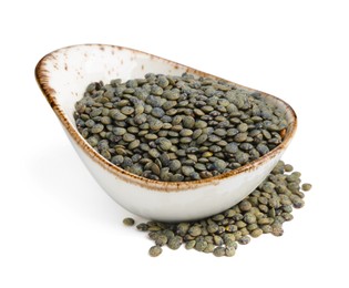 Photo of Raw lentils in bowl isolated on white