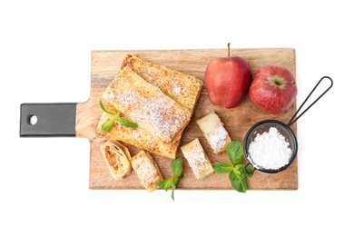 Photo of Tasty apple strudels with powdered sugar, fruits and mint isolated on white, top view