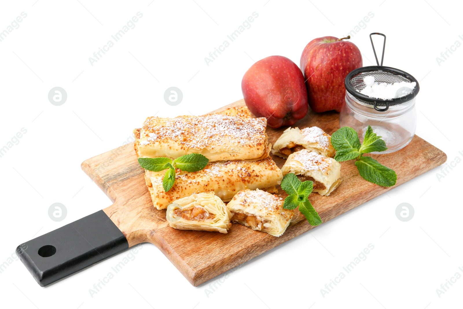 Photo of Tasty apple strudels with powdered sugar, fruits and mint isolated on white