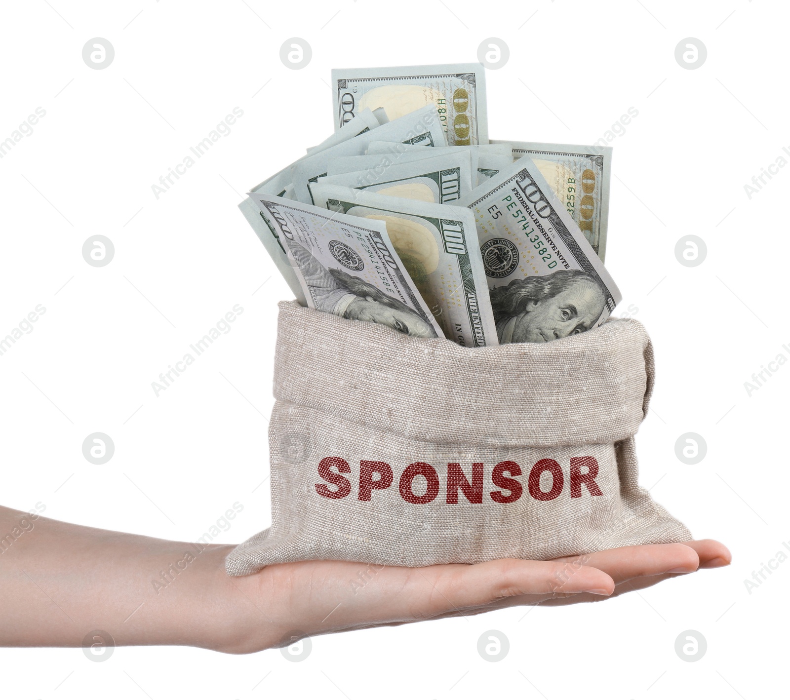 Image of Woman holding sack with word Sponsor full of dollar banknotes on white background, closeup