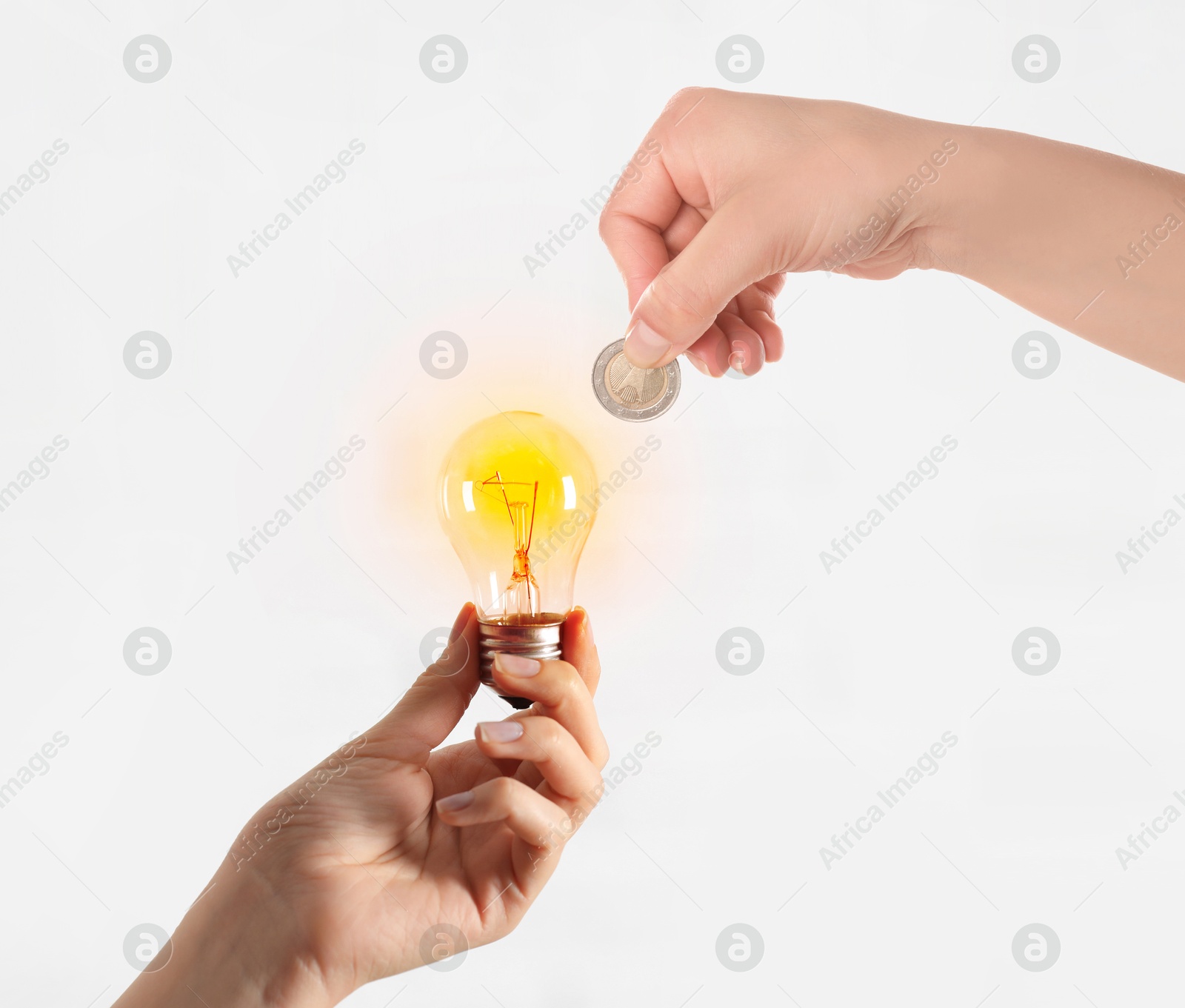 Image of Sponsor offering coin to woman with glowing light bulb on white background, closeup. Sponsorship of idea