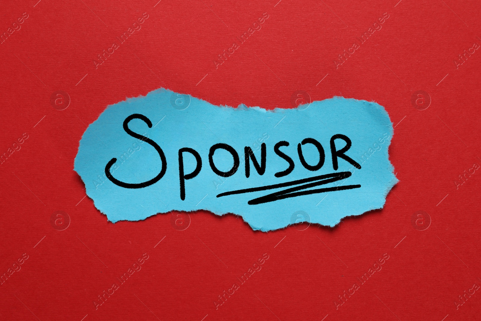 Image of Piece of light blue paper with word Sponsor on red background, top view