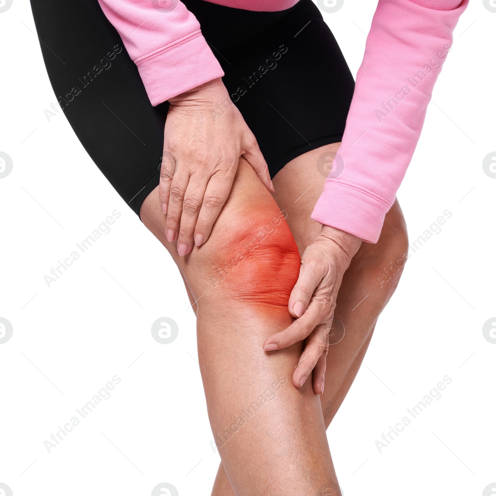 Image of Senior woman suffering from pain in knee on white background, closeup