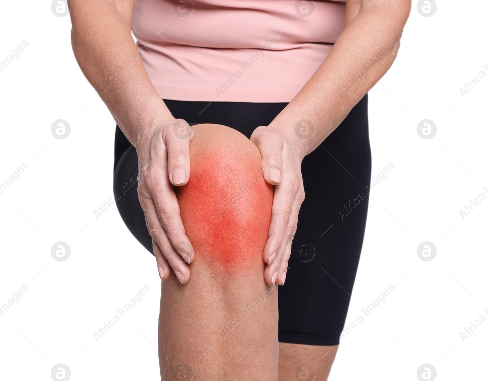 Image of Senior woman suffering from pain in knee on white background, closeup