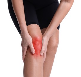 Senior woman suffering from pain in knee on white background, closeup