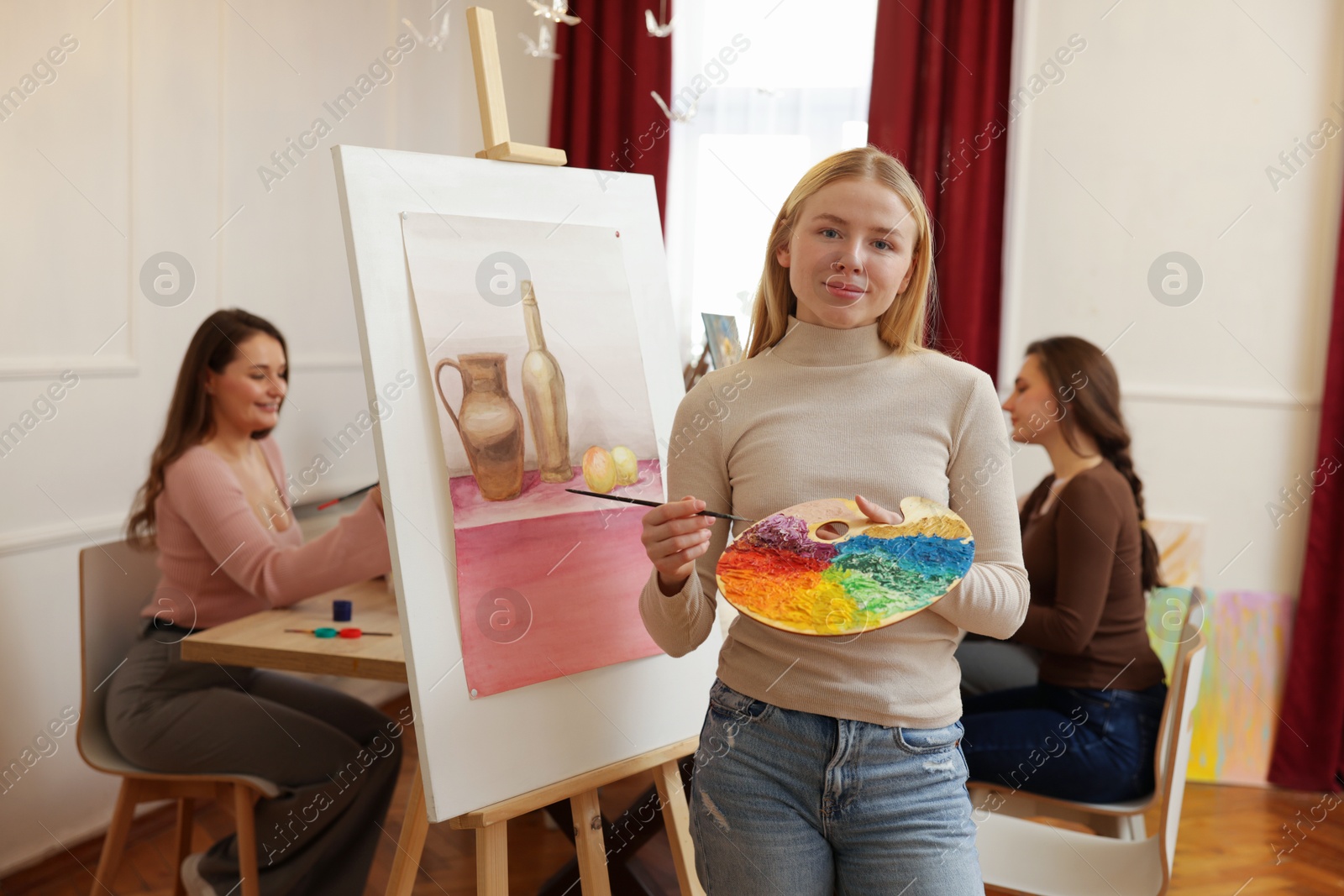 Photo of Group of women learning to draw in class