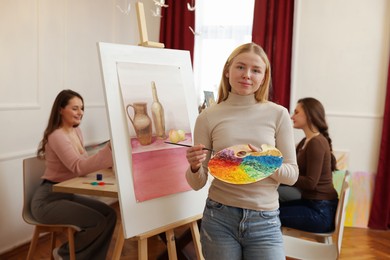 Photo of Group of women learning to draw in class