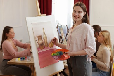 Group of women learning to draw in class