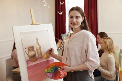 Group of women learning to draw in class