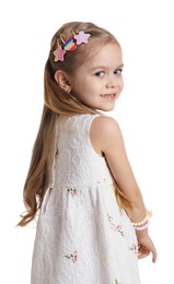 Photo of Cute little girl with beautiful hair clips on white background