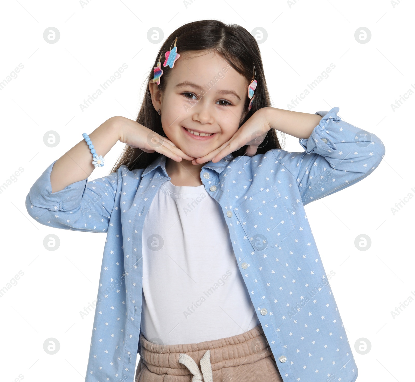 Photo of Happy little girl wearing beautiful hair accessories on white background