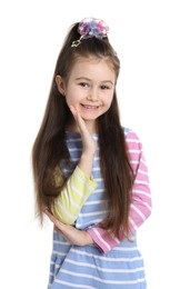 Photo of Happy little girl wearing beautiful hair accessories on white background