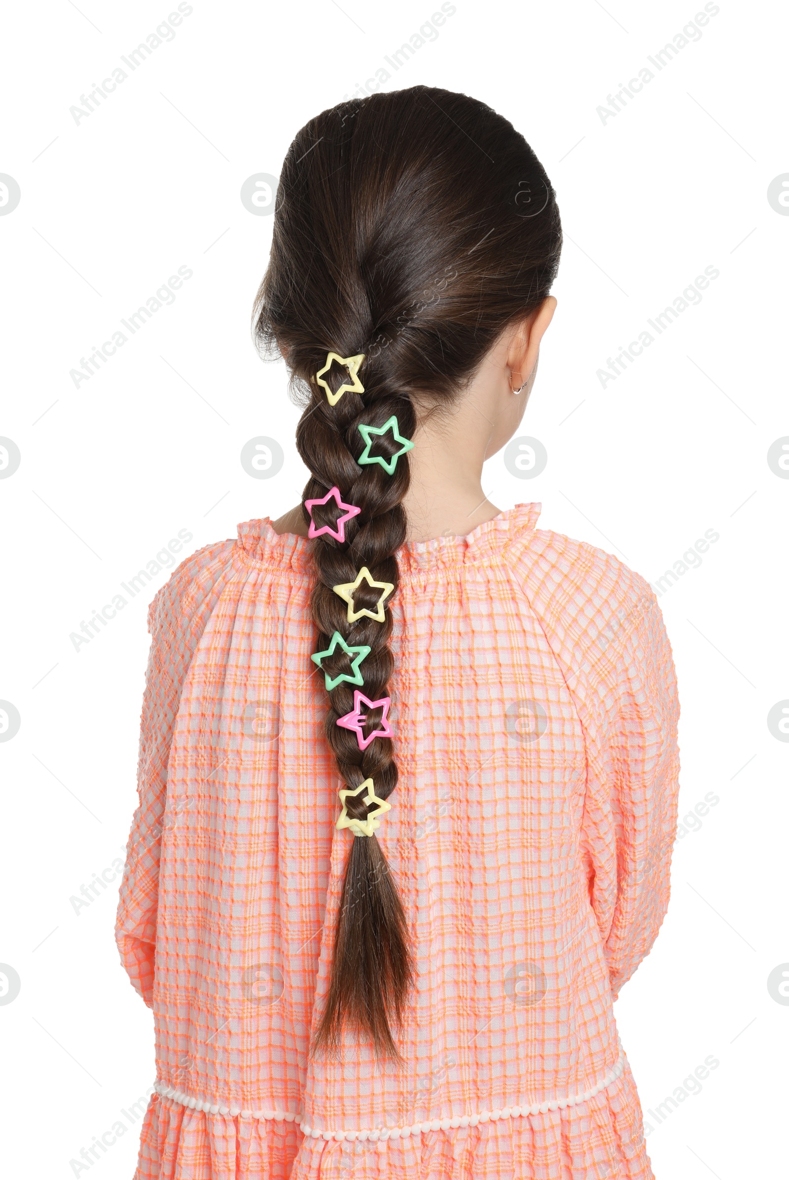 Photo of Little girl wearing beautiful hair accessories on white background, back view