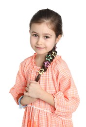 Little girl wearing beautiful hair accessories on white background