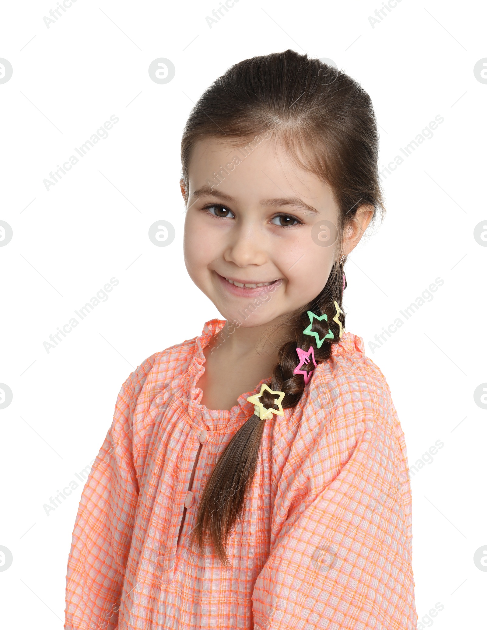 Photo of Happy little girl wearing beautiful hair accessories on white background