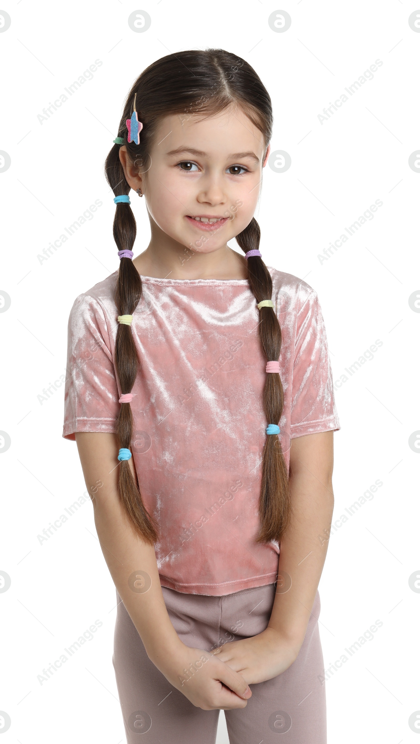 Photo of Little girl wearing beautiful hair accessories on white background