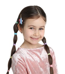 Little girl wearing beautiful hair accessories on white background