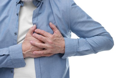 Heart attack. Senior man suffering from pain in chest on white background, closeup