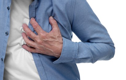 Heart attack. Senior man suffering from pain in chest on white background, closeup