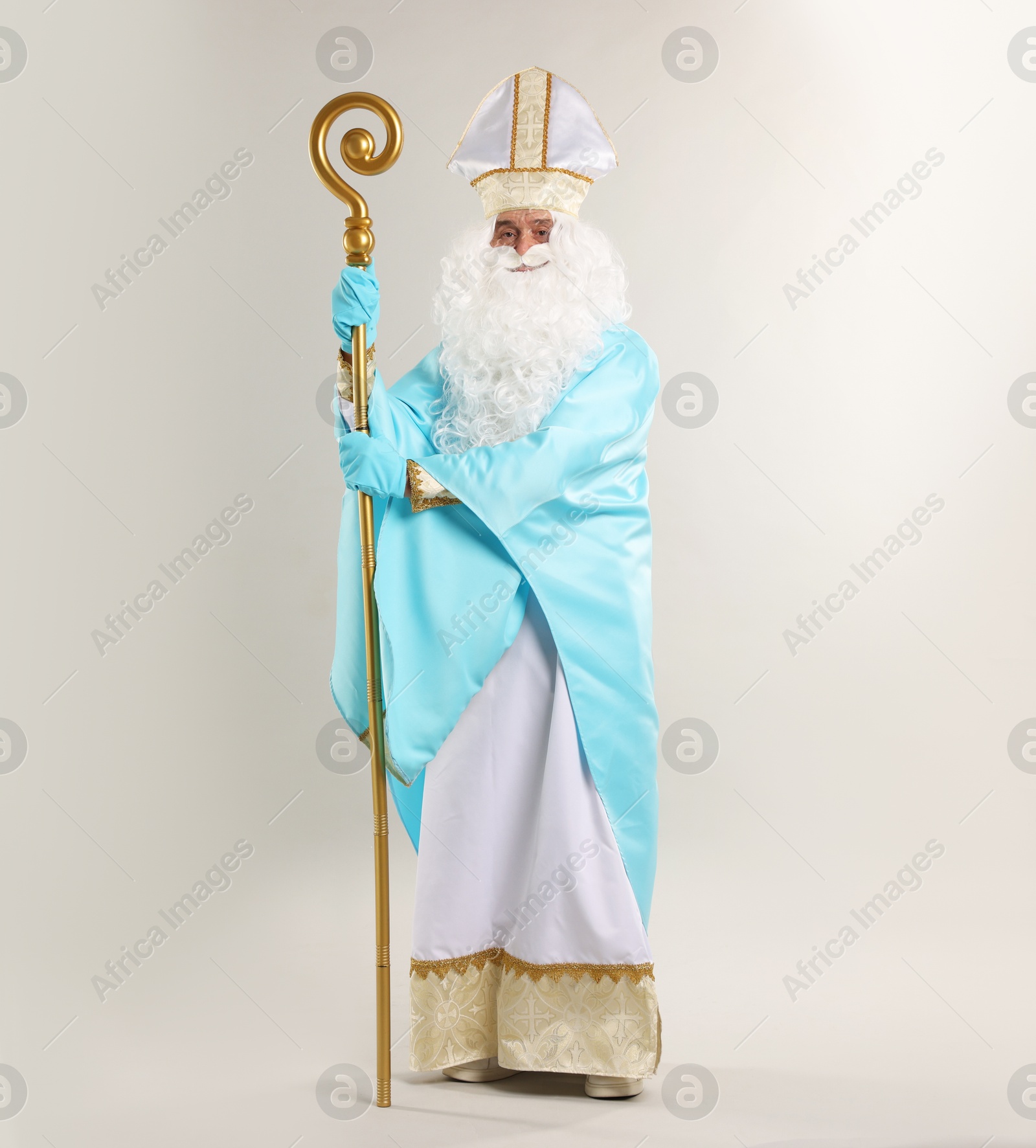 Photo of Saint Nicholas with crozier on gray background