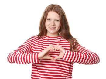 Photo of Beautiful freckled teenage girl making heart with hands on white background