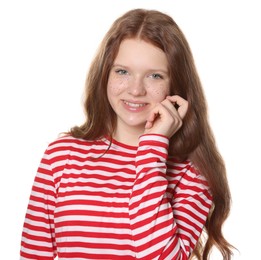 Beautiful teenage girl with freckles on white background